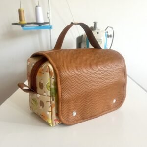 Maleta do bebê - feita em material sintético que imita couro